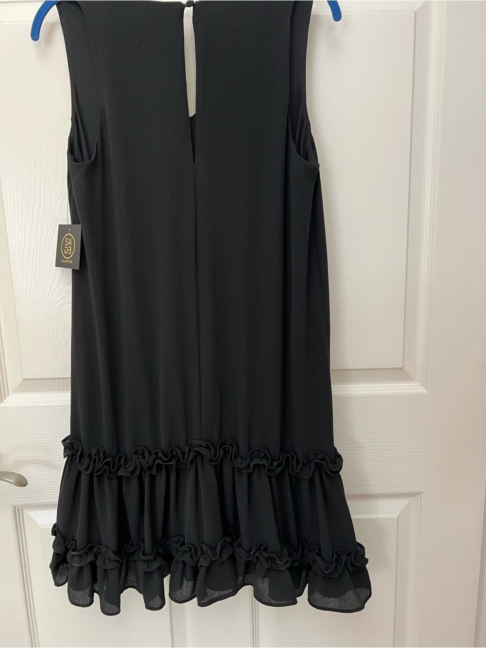 Sage Black Sleeveless Ruffle-Hem Mini Dress